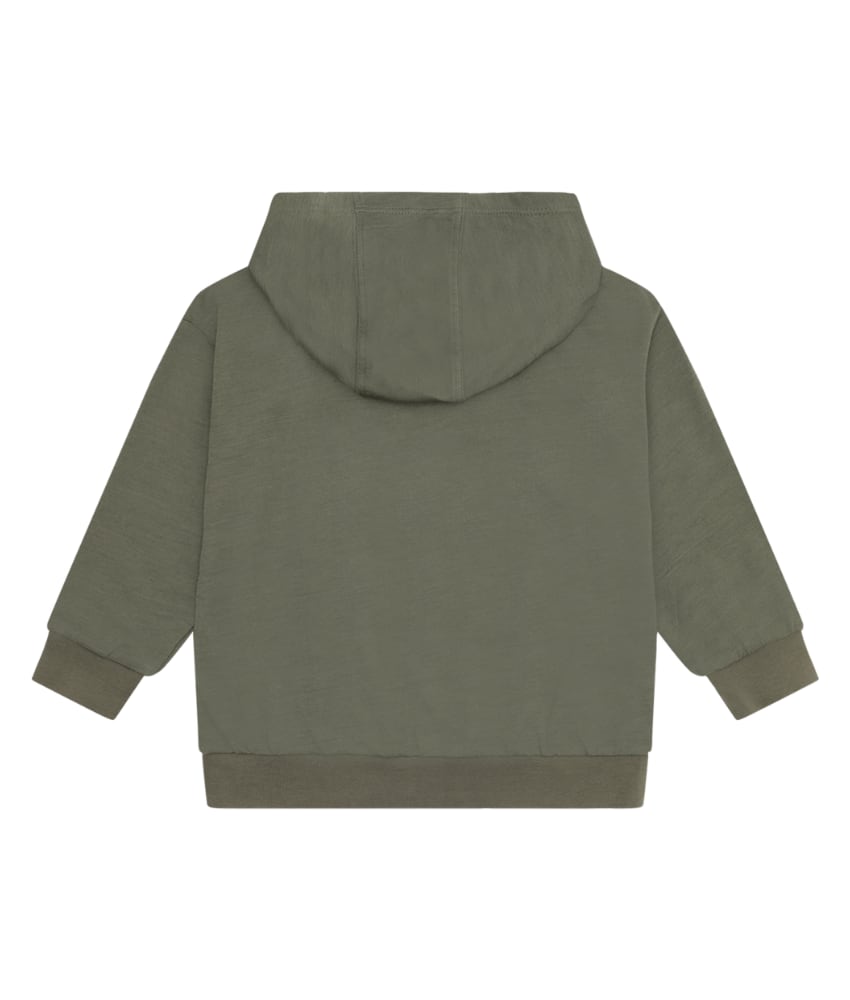 Varm og myk hettegenser fra Hust&Claire laget av 50% merinoull, 45% bambusviskose og 5% polyamid. Det er myk bambusviskose innerst mot huden og ull på utsiden som luner godt. Dette er en ullkvalitet som er fin for sensitiv hud. Sertifisert med Standard 100 fra OEKO-TEX®.