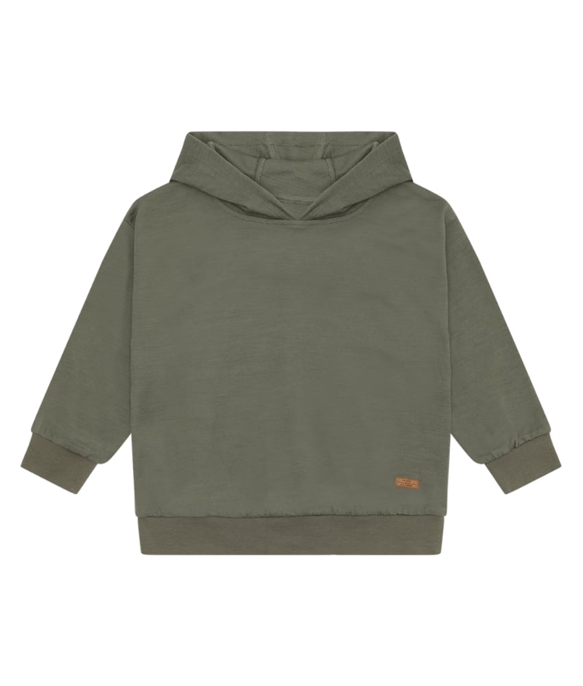 Varm og myk hettegenser fra Hust&Claire laget av 50% merinoull, 45% bambusviskose og 5% polyamid. Det er myk bambusviskose innerst mot huden og ull på utsiden som luner godt. Dette er en ullkvalitet som er fin for sensitiv hud. Sertifisert med Standard 100 fra OEKO-TEX®.