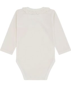 Varm og myk body fra Hust&Claire laget av 50% merinoull, 45% bambusviskose og 5% polyamid. Det er myk bambusviskose innerst mot huden og ull på utsiden som luner godt. Dette er en ullkvalitet som er fin for sensitiv hud. Sertifisert med Standard 100 fra OEKO-TEX®.